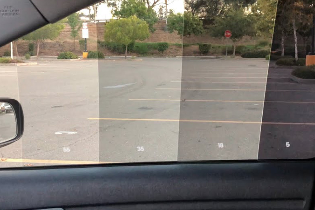Commercial truck side window displaying clean tinted glass finish