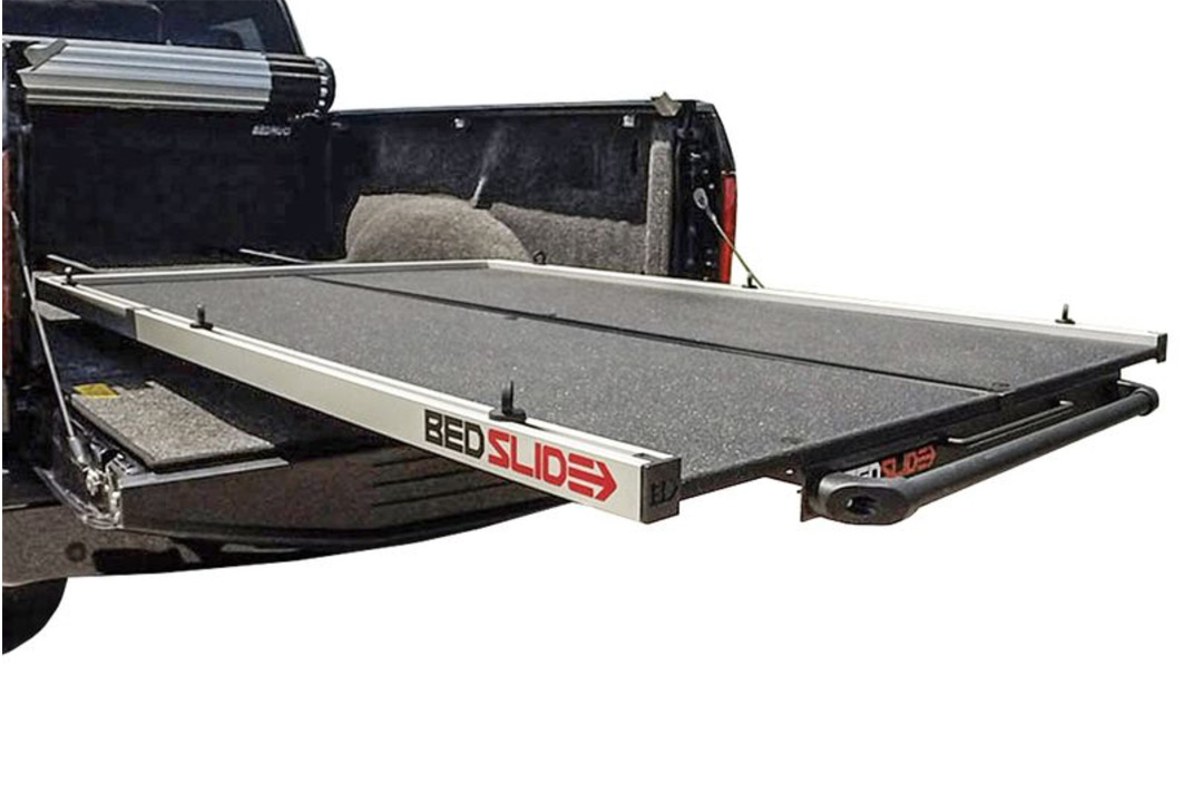 Commercial truck bed sliding cargo platform installed on a fleet vehicle