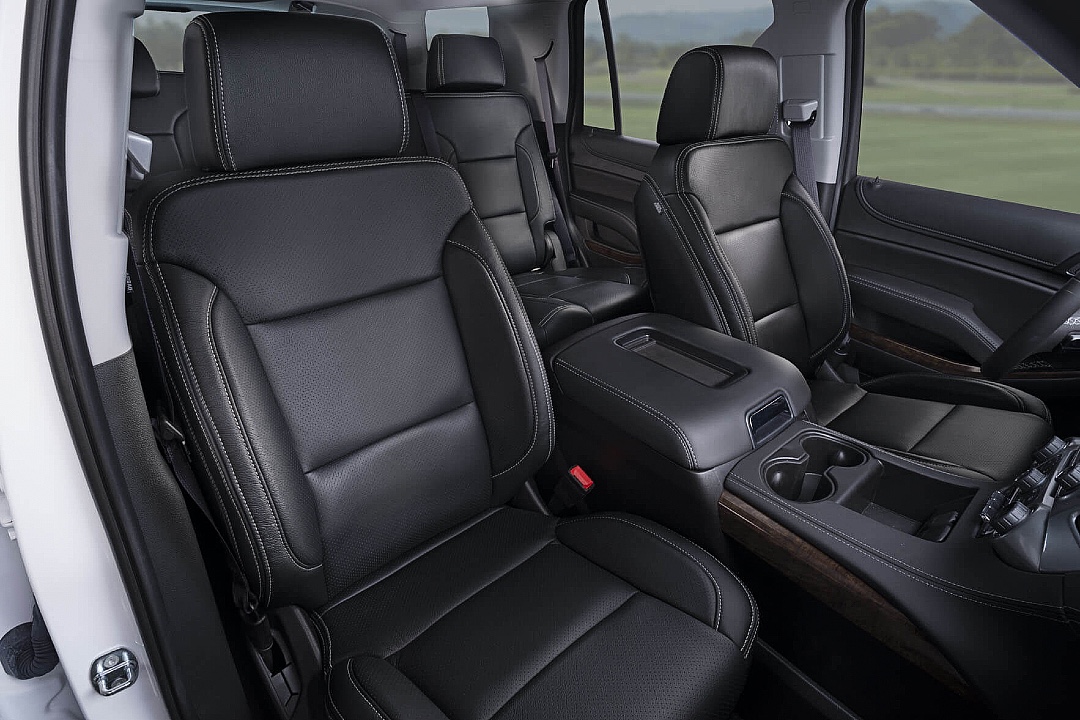 Black leather SUV front seats and center console upholstery