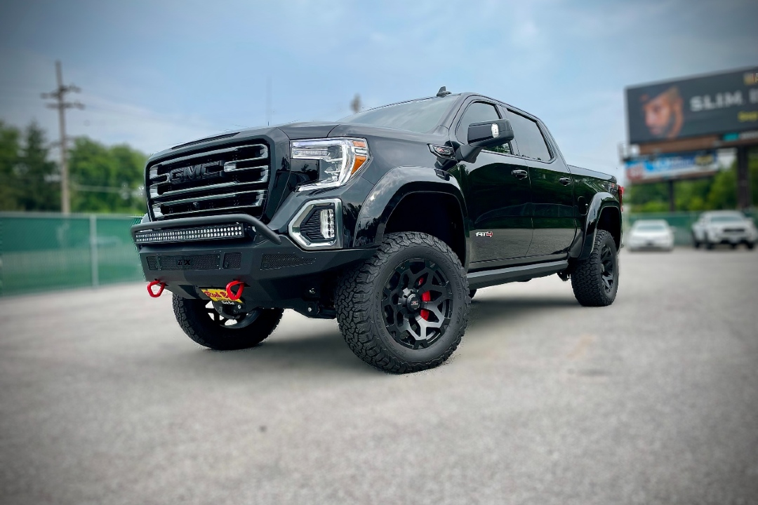 GMC Sierra AT4 equipped with front steel bumper and integrated LED light bar